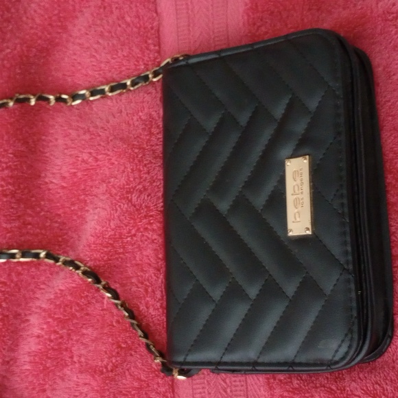 bebe Handbags - 💕2/$10 EUC BEBE SMALL GOLD AND BLACK  PURSE.